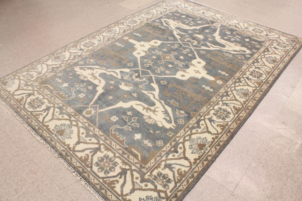 Appraisal: CONTEMPORARY HAND KNOTTED ORIENTAL CARPET Indo-Persian three curvilinear medallions design