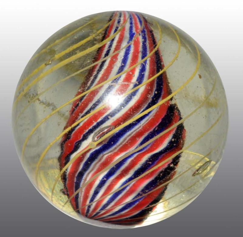 Appraisal: Solid Core Marble Description Solid barber pole swirl in red