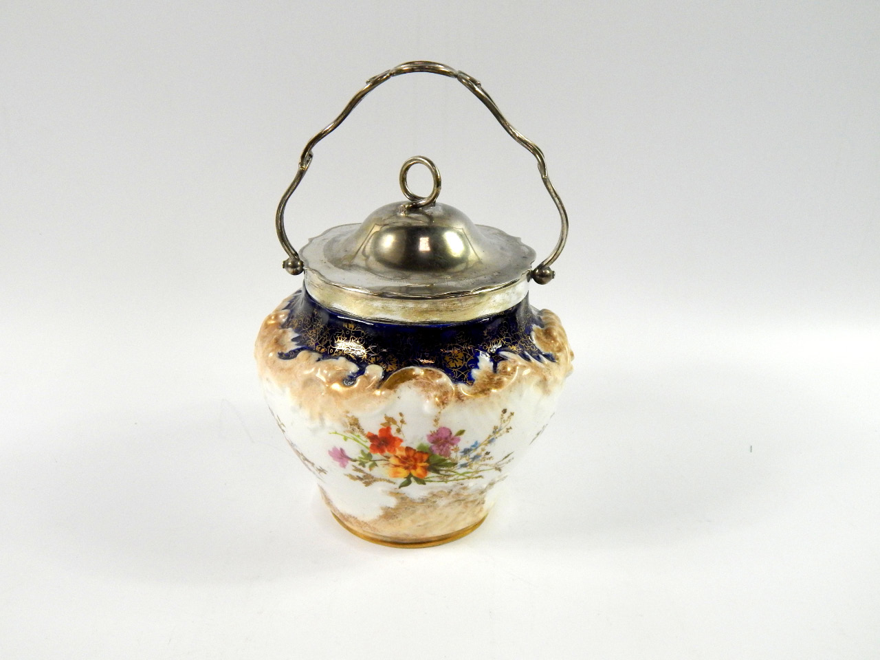 Appraisal: A Doulton porcelain biscuit barrel with plated mount and lid