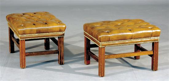 Appraisal: Pair English leather and mahogany footstools buttoned brown leather seat