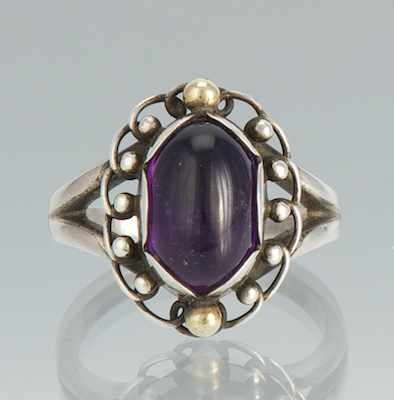 Appraisal: A Georg Jensen Silver Gold and Amethyst Ring Sterling silver