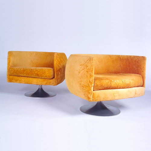 Appraisal: MODERN Pair of lounge chairs with orange crushed velour upholstery