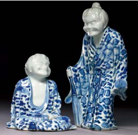 Appraisal: TWO ANTIQUE ARITA FIGURES Two antique Japanese blue and white