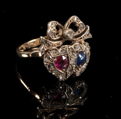 Appraisal: A ruby sapphire and diamond ring converted from a th