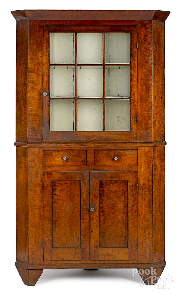 Appraisal: Pennsylvania tiger maple two-part corner cupboard Exclusive on Bidsquare Pennsylvania