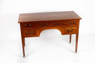 Appraisal: A th Century mahogany kneehole dressing table crossbanded and fitted