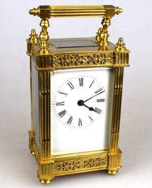 Appraisal: A brass carriage clock the reeded case with blind fret