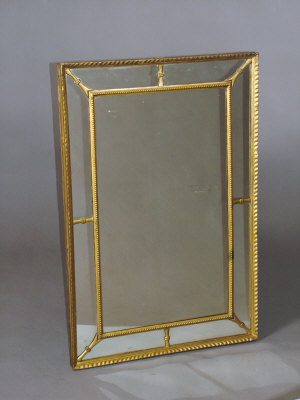 Appraisal: A pair of giltwood marginal wall mirrors late th century