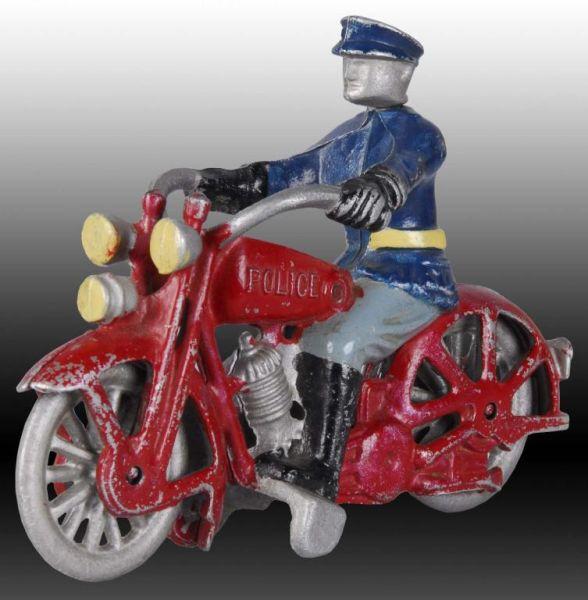 Appraisal: Aluminum State Police Motorcycle Toy Description Policeman rider Dual headlights