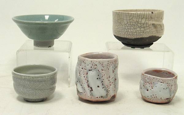 Appraisal: Five Japanese teacups One with red-splashed celadon glaze two with