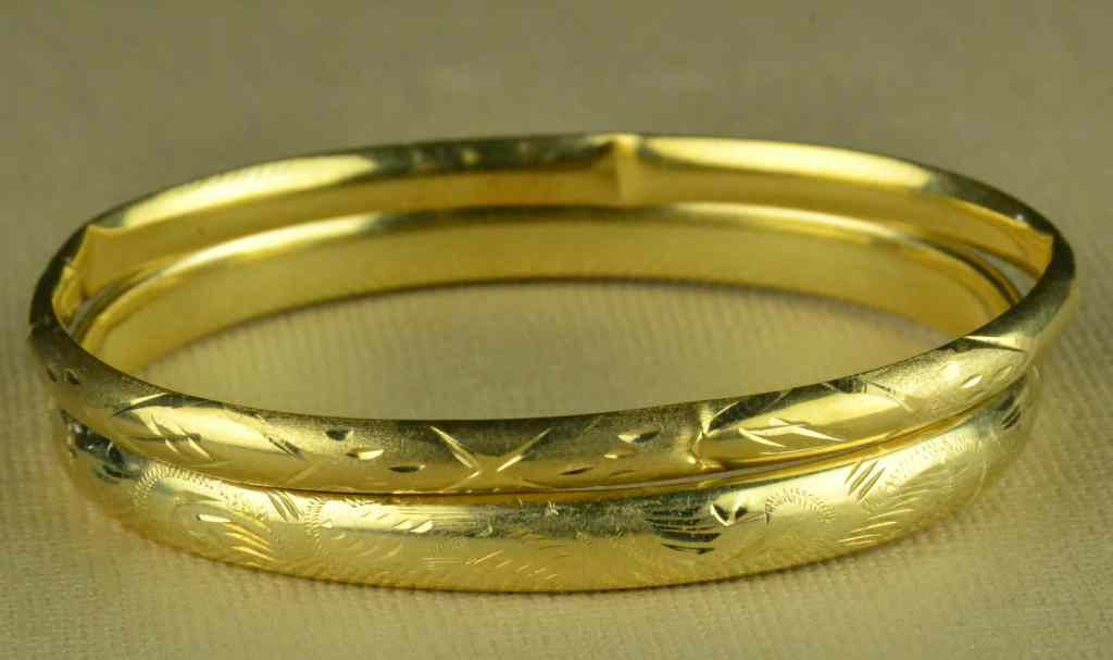 Appraisal: K K Gold Bangle BraceletsTo include one K etched bracelet