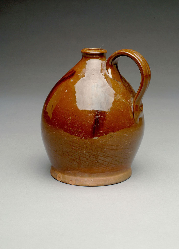 Appraisal: AMERICAN GLAZED REDWARE JUG NEW ENGLAND CIRCA Of bulbous form