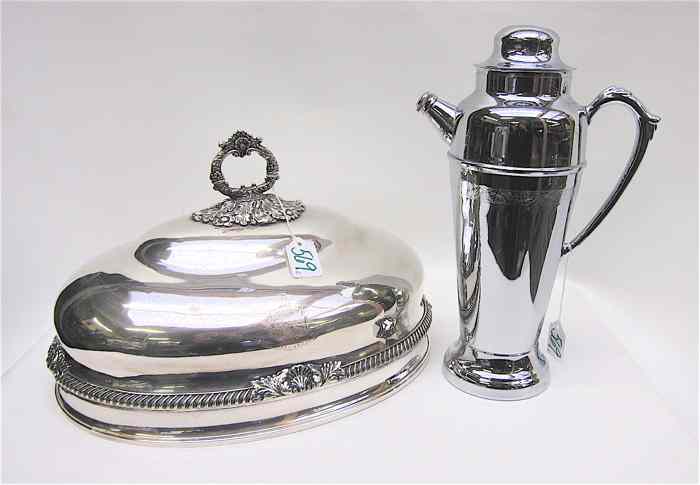 Appraisal: TWO SILVER-PLATED HOLLOWWARE PIECES large roast cover having chased and