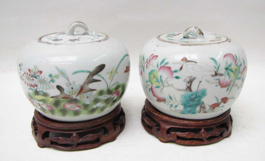 Appraisal: PAIR CHINESE PORCELAIN LIDDED JARS hand enameled with birds insects