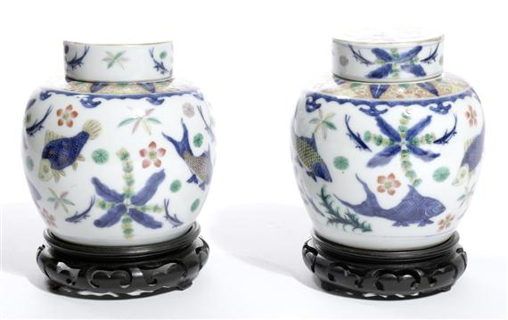 Appraisal: A PAIR OF PAINTED AND GILT SMALL POTS WITH COVER