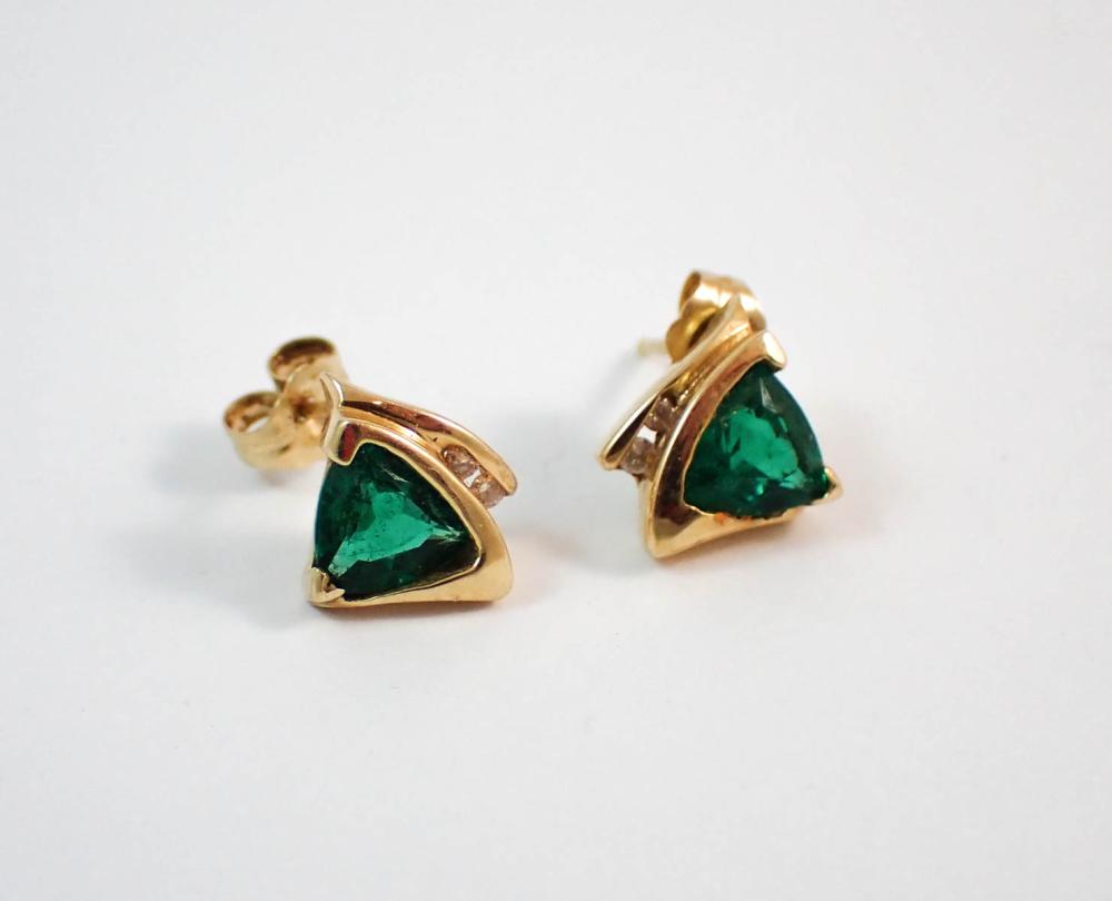 Appraisal: PAIR OF EMERALD AND DIAMOND STUD EARRINGS each accented with