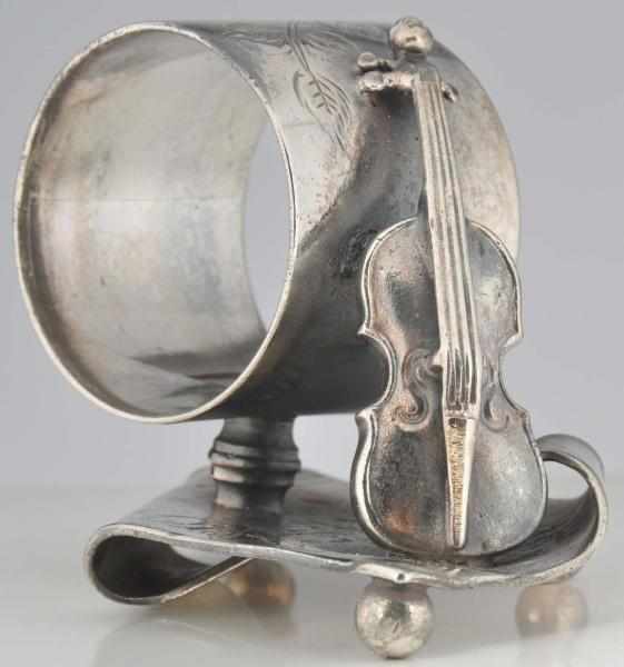 Appraisal: Violin on Sheet Music Base Figural Napkin Ring By Wilcox