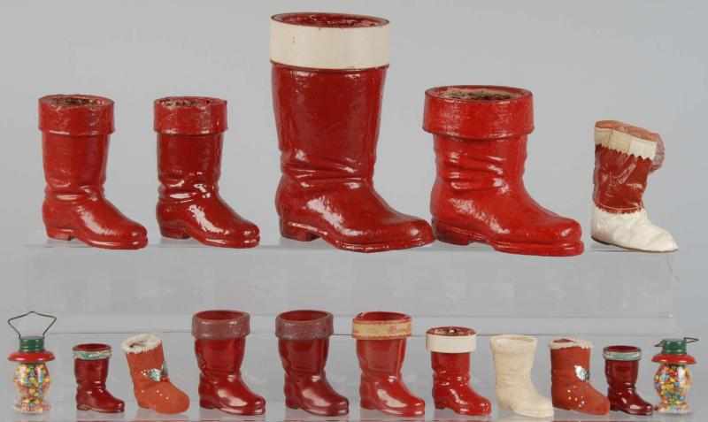 Appraisal: Lot of Paper Mache Christmas Items Description Includes Santa's boots