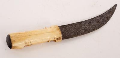 Appraisal: A Persian steel dagger with etched blade and bone handle