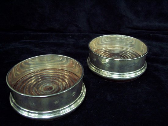 Appraisal: A pair of coasters with turned wood bases cm diameter