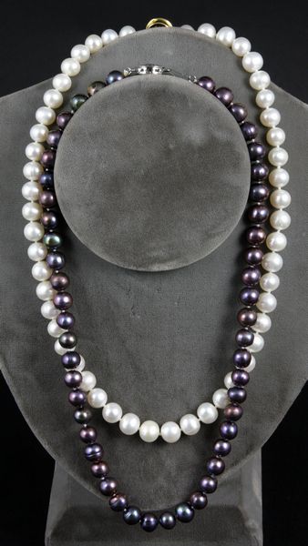 Appraisal: Two pearl necklaces including one lustrous white with pearls mm