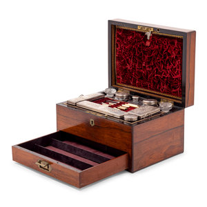 Appraisal: A Victorian Rosewood Dressing Box Circa fitted with nine glass