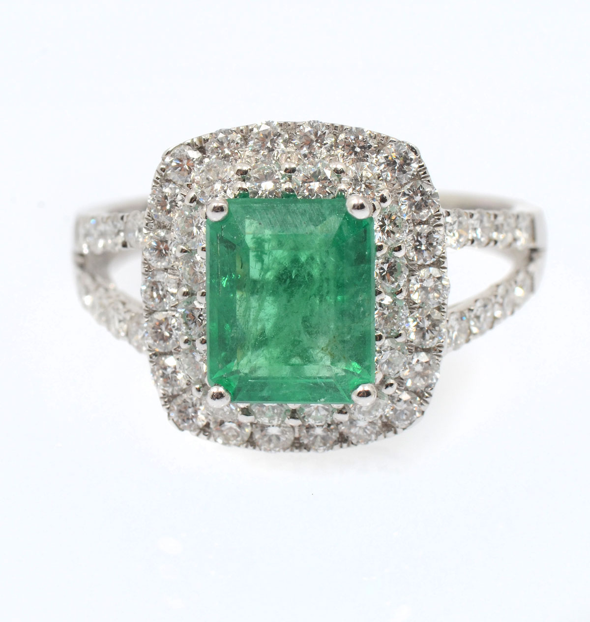 Appraisal: K EMERALD DIAMOND RING A CT emerald is featured in