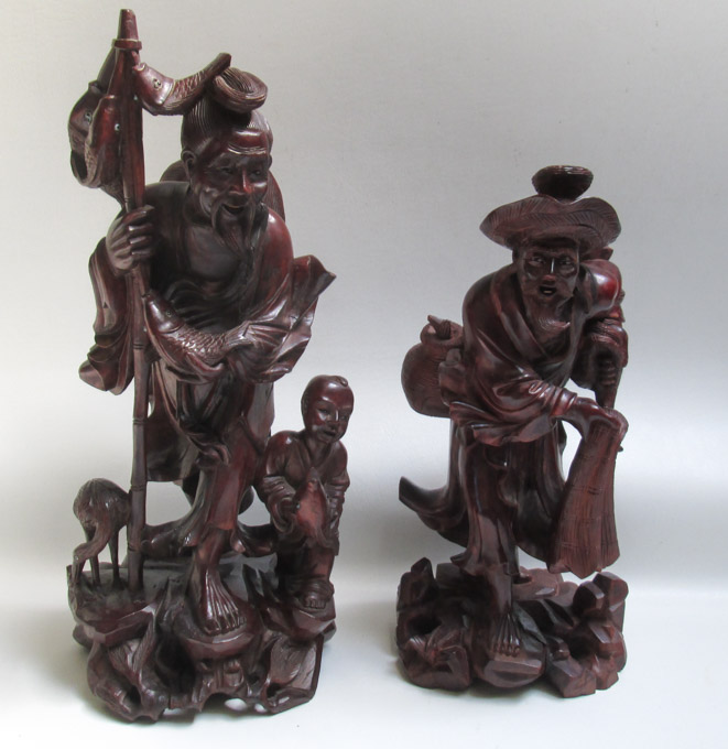 Appraisal: TWO CHINESE CARVED HARDWOOD FISHERMAN FIGURES the first depicting a