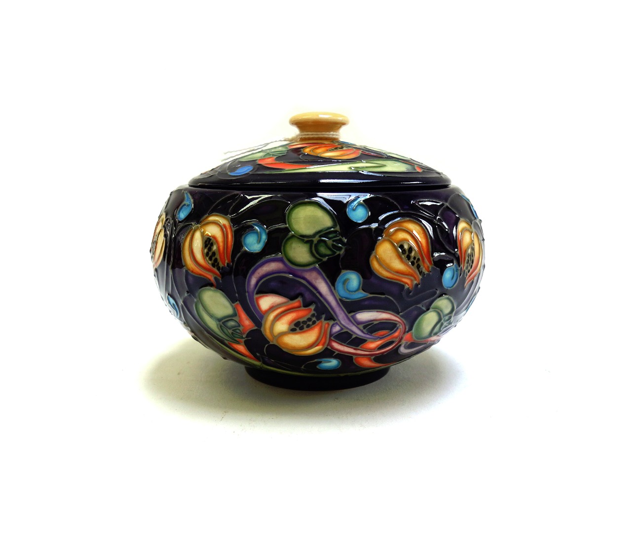 Appraisal: A Moorcroft 'Celtic Webb' circular box and cover by Emma