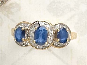 Appraisal: SAPPHIRE RING k gold three stone sapphire ring each sapphire