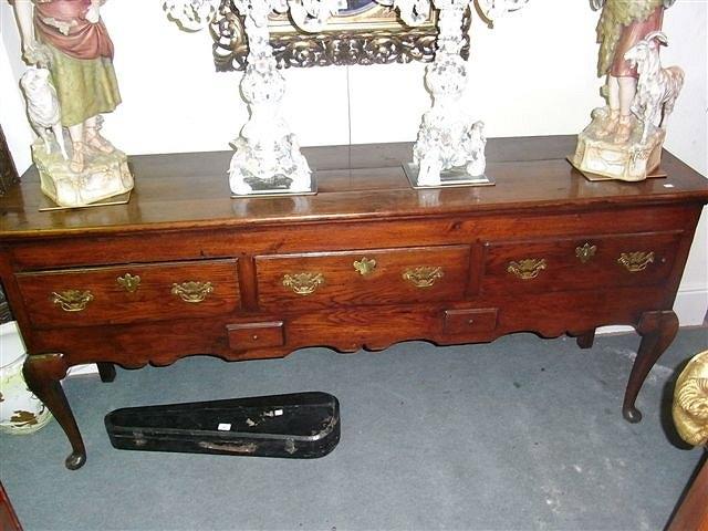 Appraisal: A GEORGE II OAK DRESSER circa with three drawers and