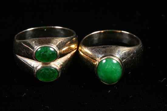 Appraisal: TWO K YELLOW GOLD AND JADEITE RINGS One set with