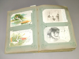 Appraisal: An Edwardian postcard album containing mainly British views and children