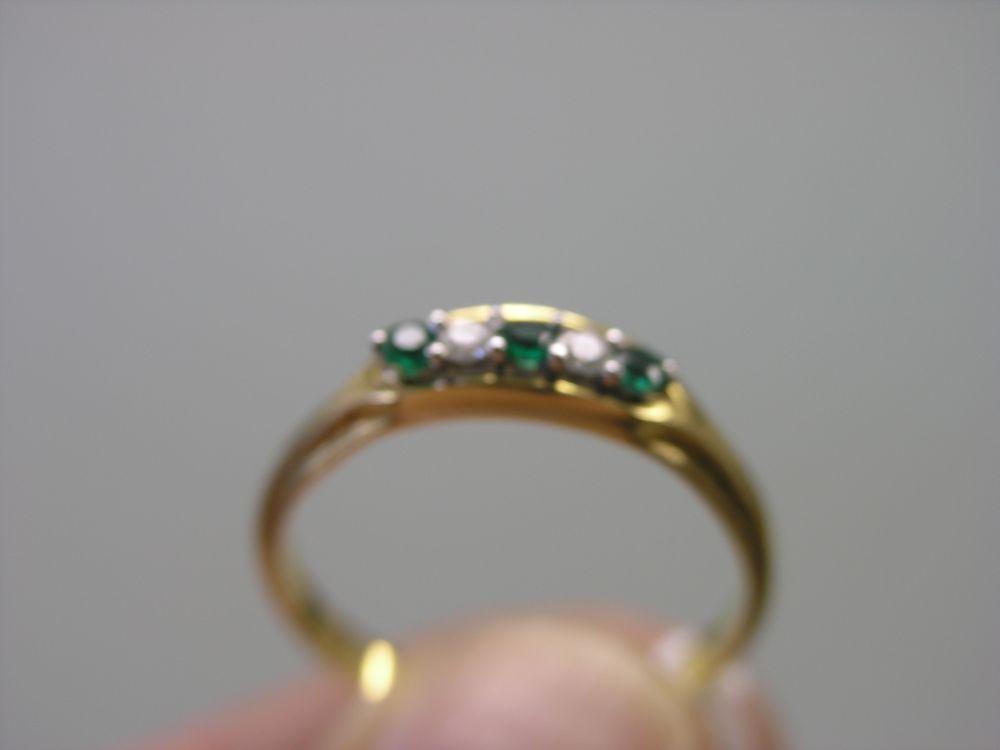 Appraisal: An ct gold ring set with two small diamonds and