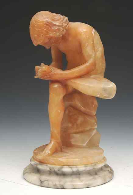 Appraisal: AN ALABASTER SCULPTURE OF A BOY PICKING A THORN FROM