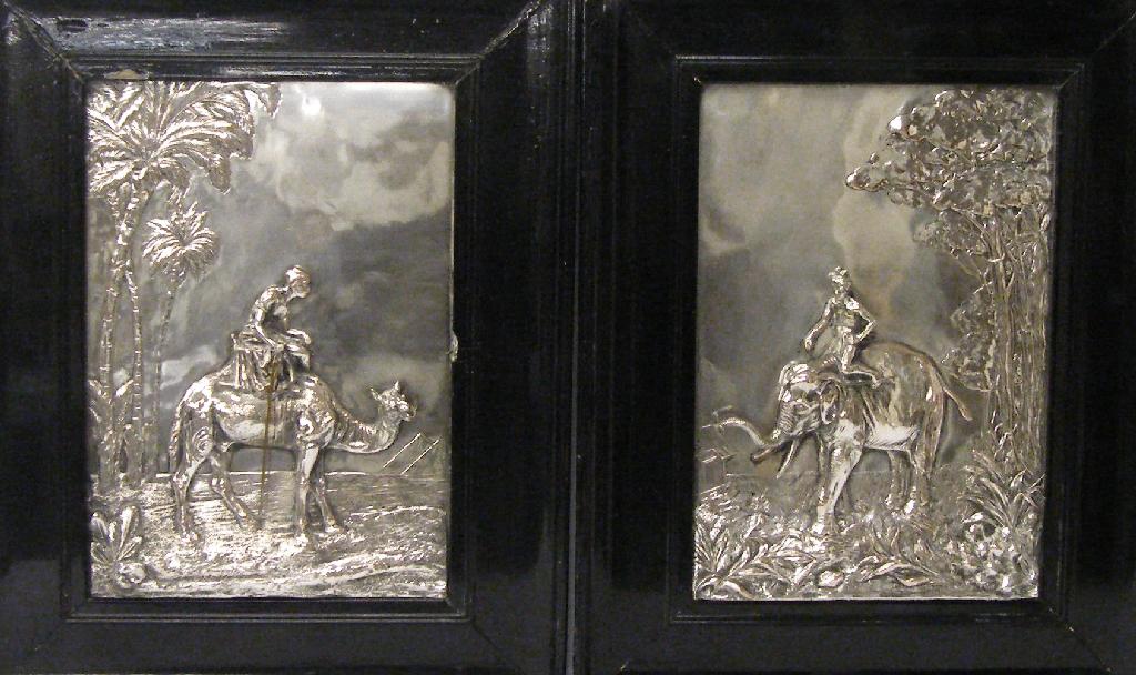 Appraisal: Interesting pair of silver plated pictorial plaques depicting an Indian