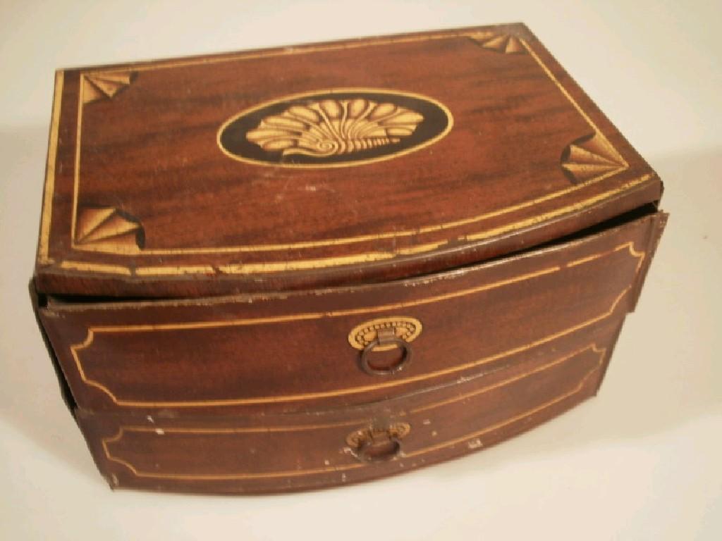 Appraisal: John Buchanan and Sons A chocolate tin in the form