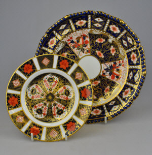 Appraisal: Royal Crown Derby - A pair of plates decorated in