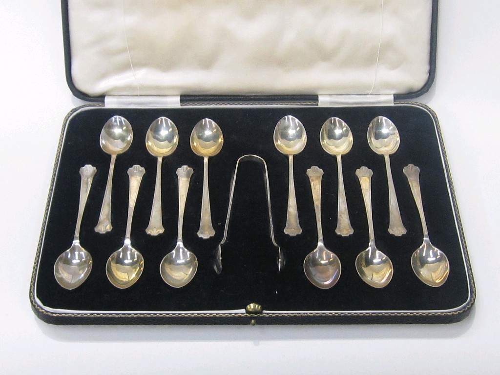 Appraisal: Cased set of twelve silver spoons with tongs Sheffield