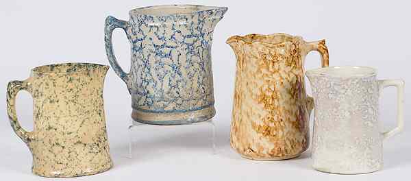 Appraisal: Stoneware Spongeware Pitchers American a group of four stoneware spongeware