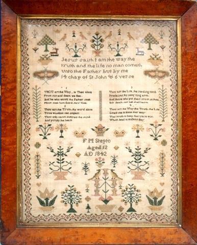 Appraisal: A Victorian sampler with mottos pictures of flowers animals and