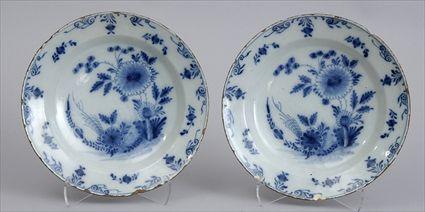 Appraisal: TWO SIMILAR DELFT BLUE AND WHITE BOWLS Each with chrysanthemum