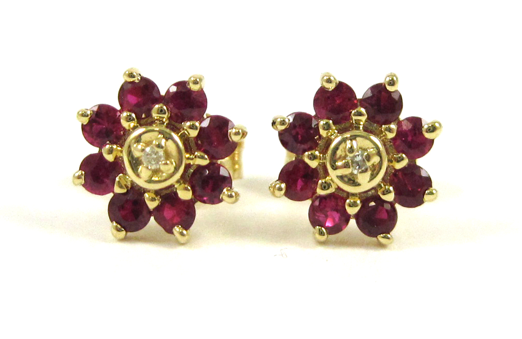 Appraisal: PAIR OF RUBY AND FOURTEEN KARAT GOLD EARRINGS each yellow