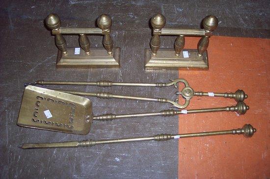 Appraisal: A set of three brass fire irons and a pair