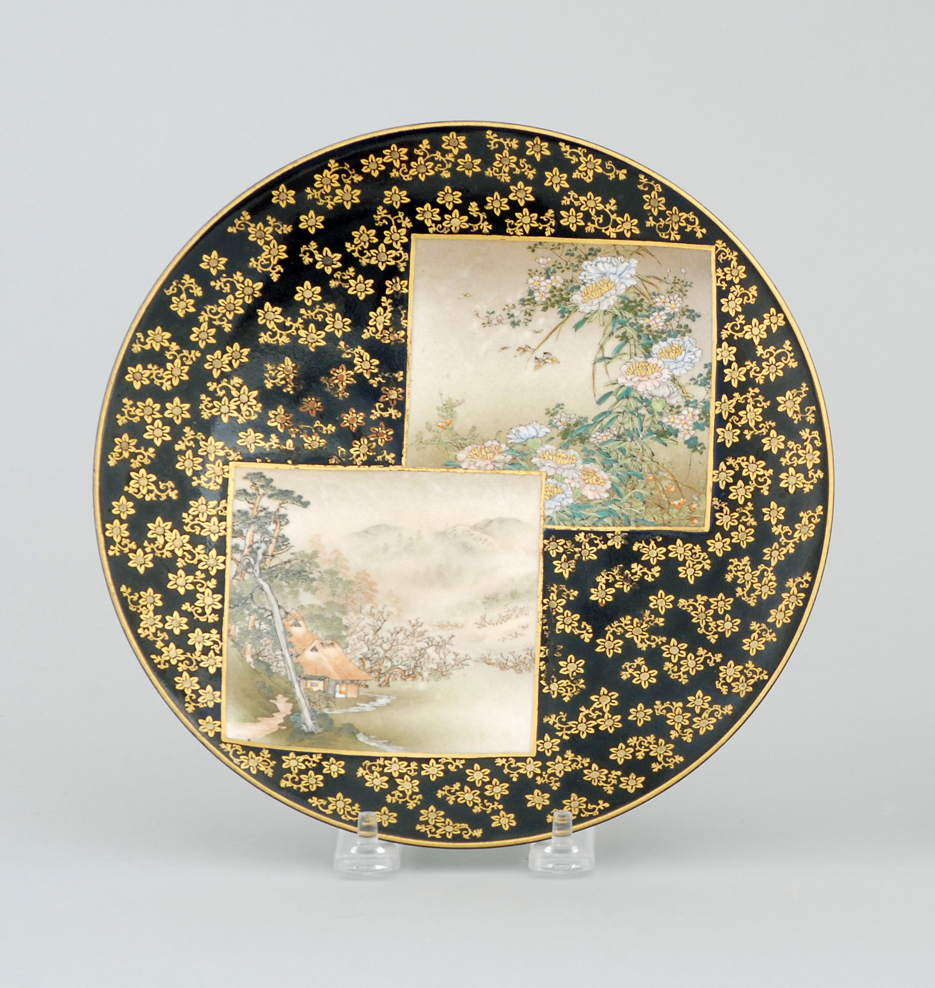 Appraisal: KINKOZAN SATSUMA POTTERY PLATE Meiji PeriodDecorated with two square cartouches