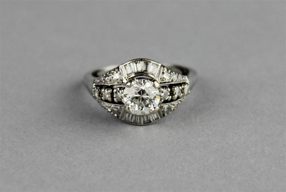 Appraisal: ONE CT DIAMOND ENGAGEMENT RING FLANKED BY BAGUETTE DIAMONDS SET