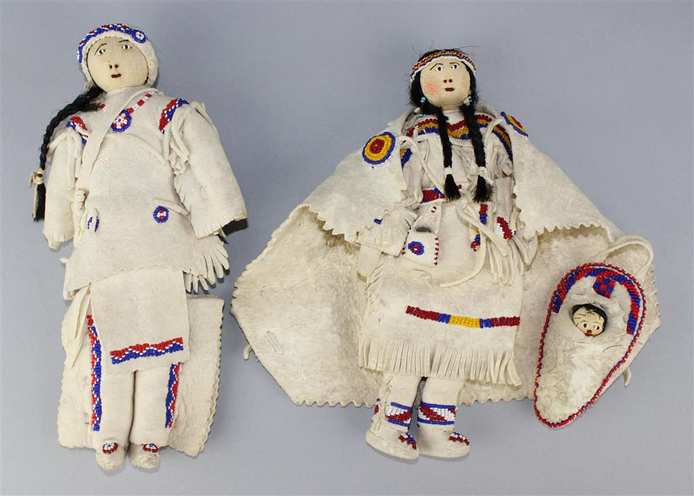 Appraisal: PAIR OF PLAINS BEADED AND FRINGED HIDE DOLLS Reservation period