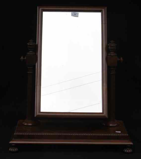 Appraisal: A TH CENTURY MAHOGANY TOILET MIRROR on platform base with