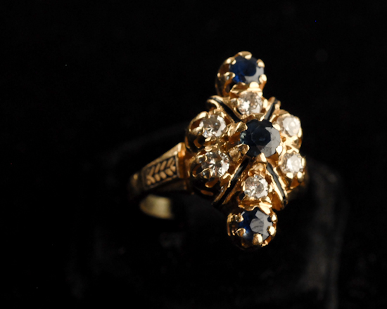 Appraisal: A Gold Diamond Sapphire and Enamel Cocktail Ring K marked