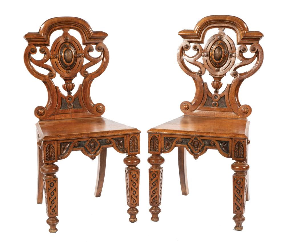 Appraisal: Pair of English Carved Oak Hall Chairs th c shaped